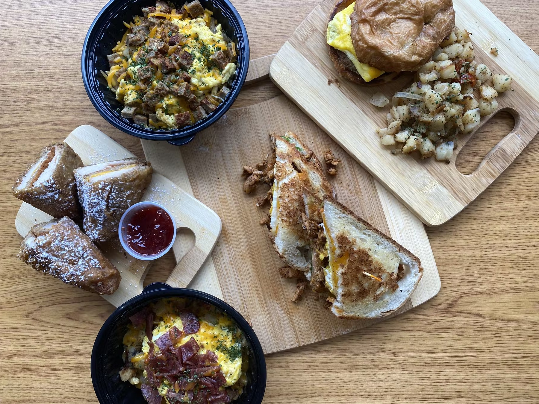 a wooden table topped with different types of food
