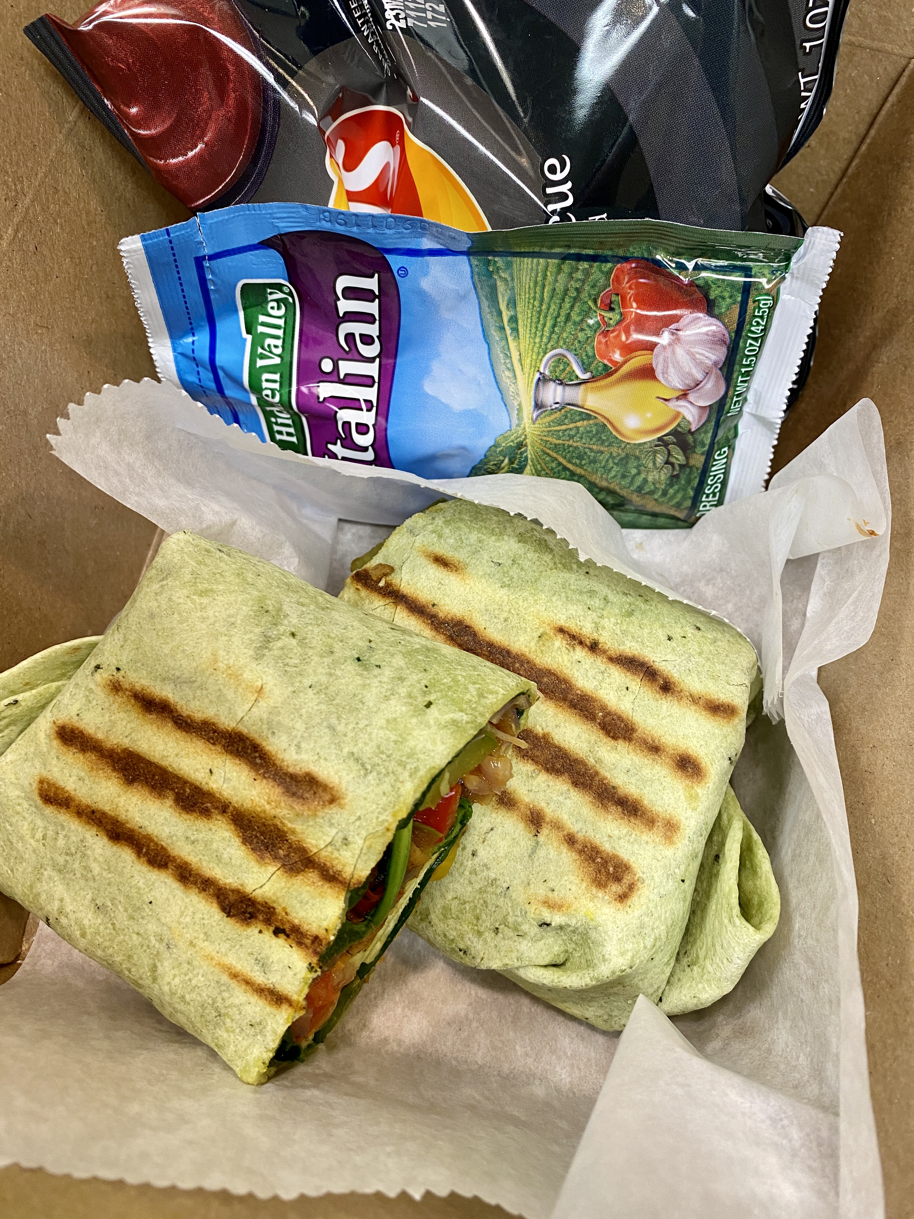 a cut in half sandwich sitting on top of a table