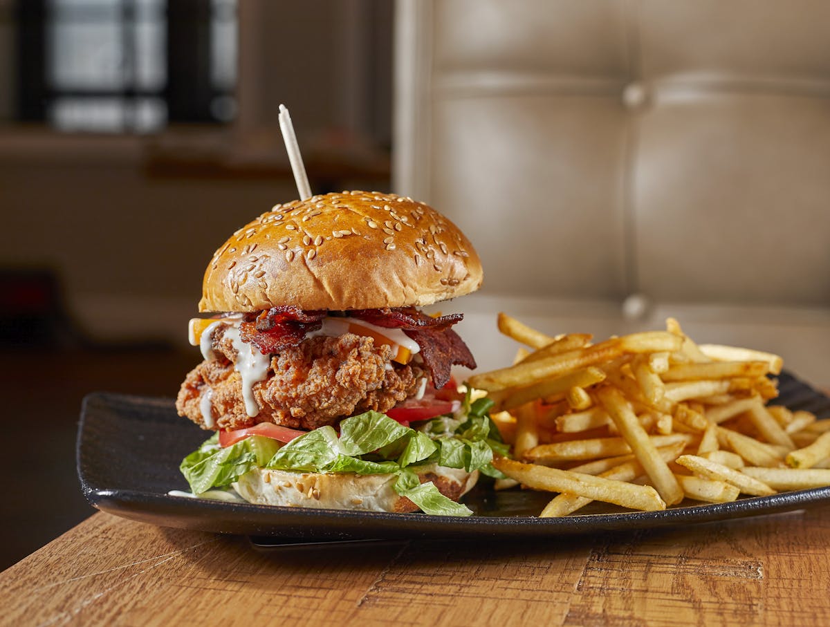 a sandwich sitting on top of a wooden table