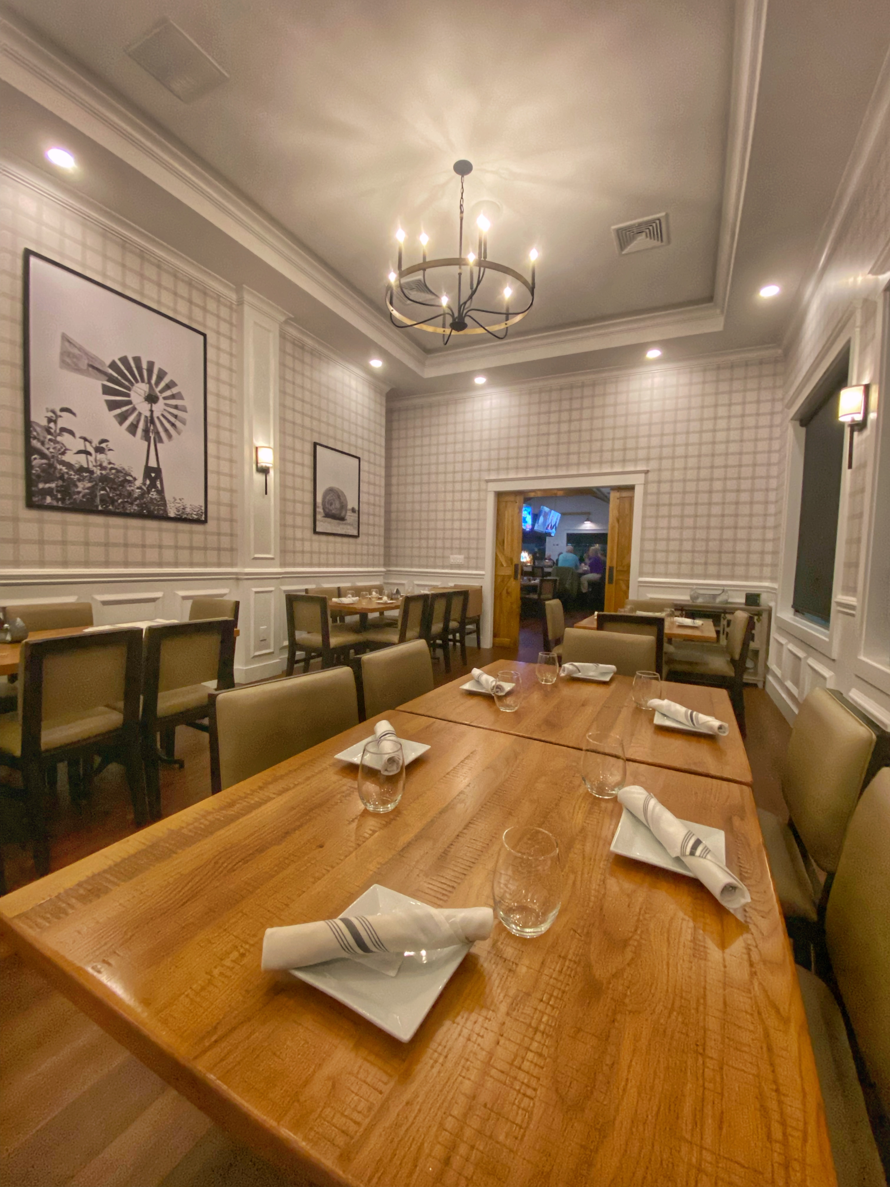 a room with a sink and a mirror