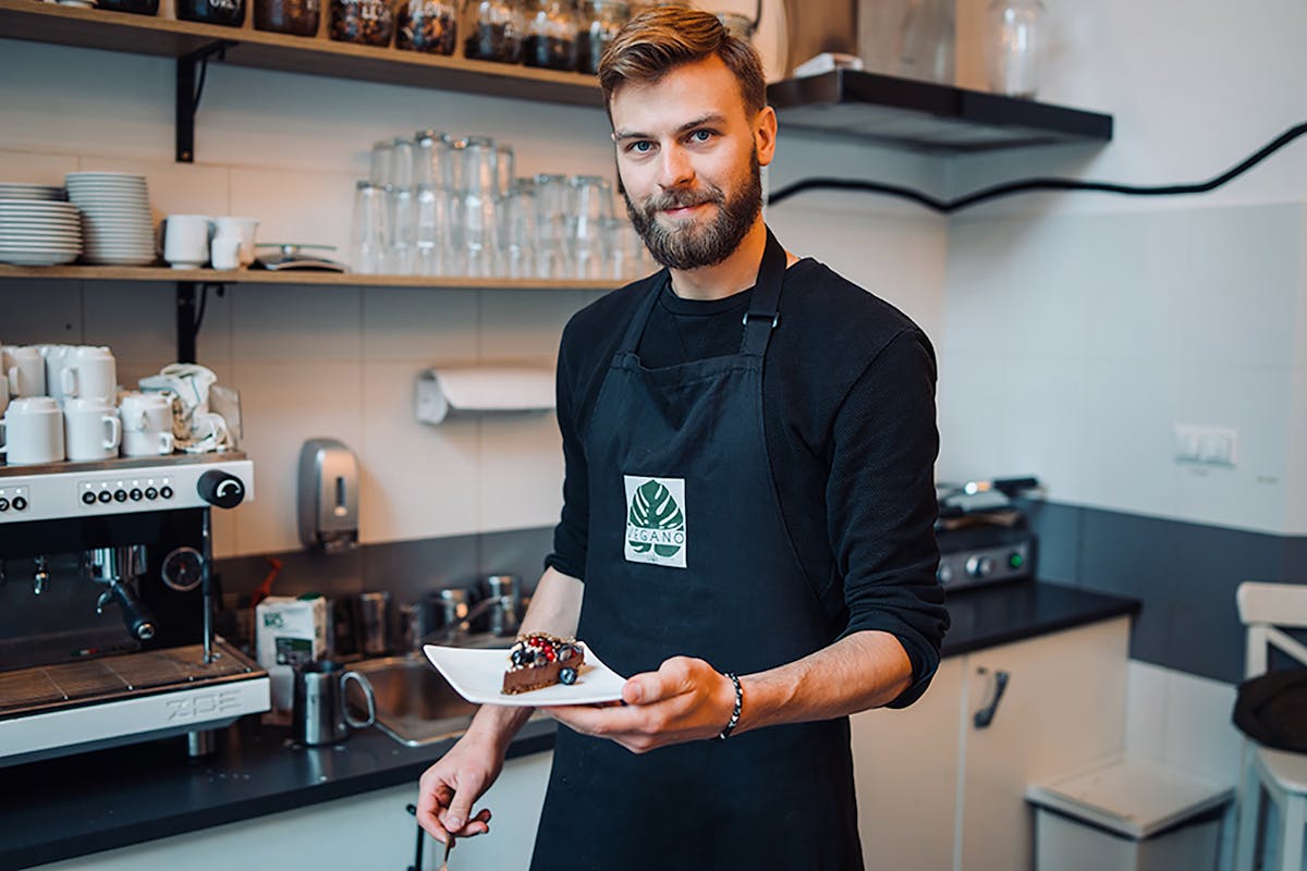 a man standing in a kitchen