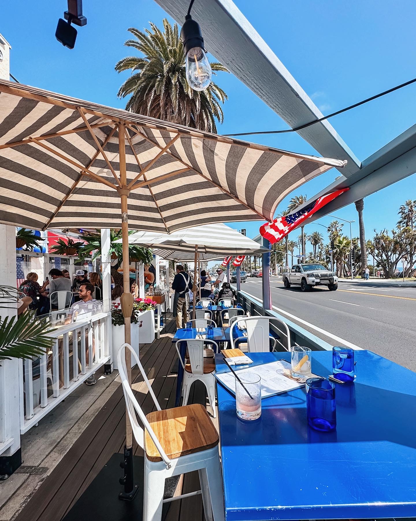 a group of people sitting at a train station