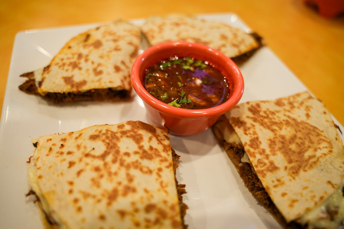 a plate of food with a slice cut out