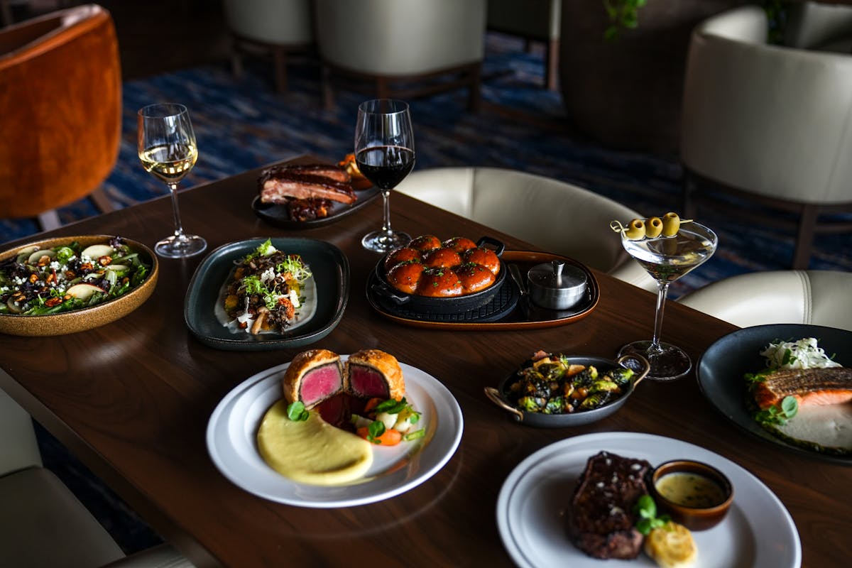 a table topped with plates of food on a plate