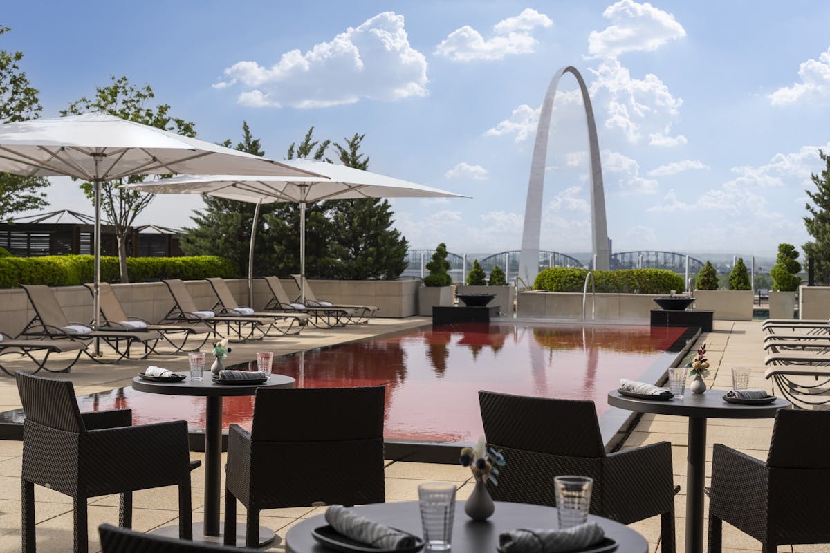 outdoor dining terrace with arch view