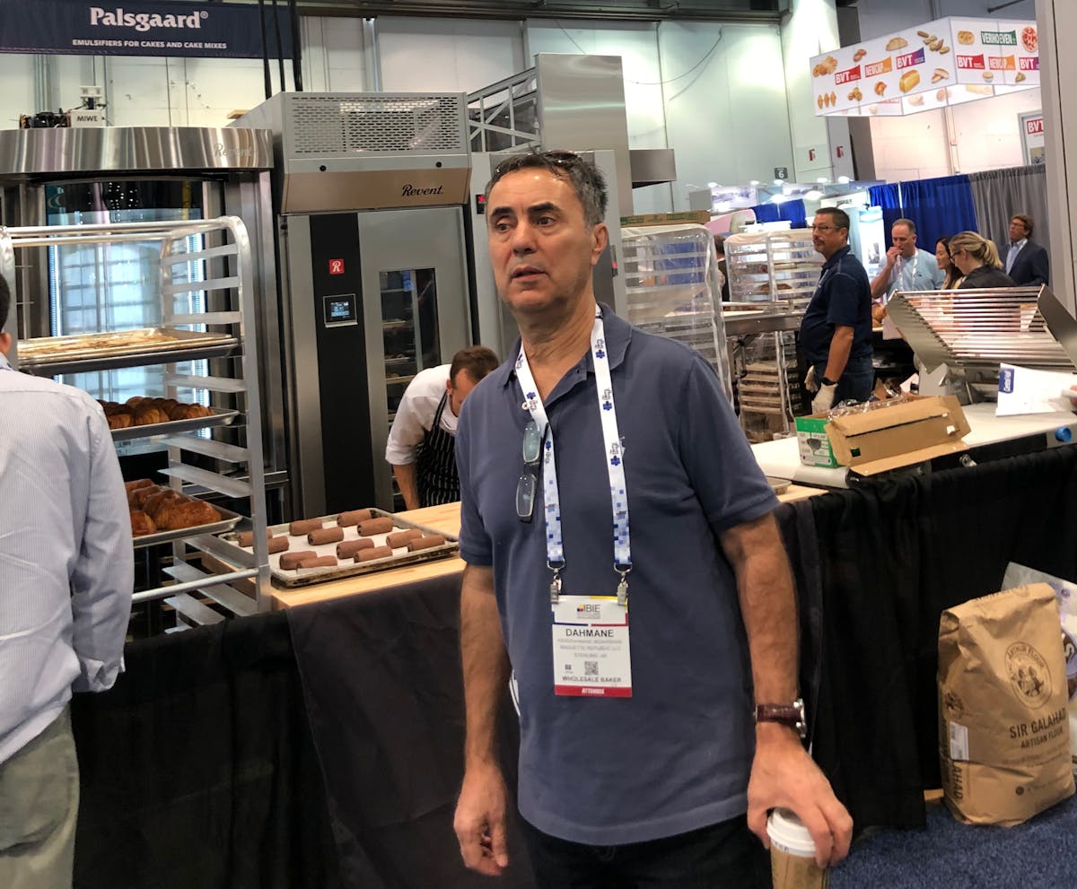 a man inside a bakery's kitchen