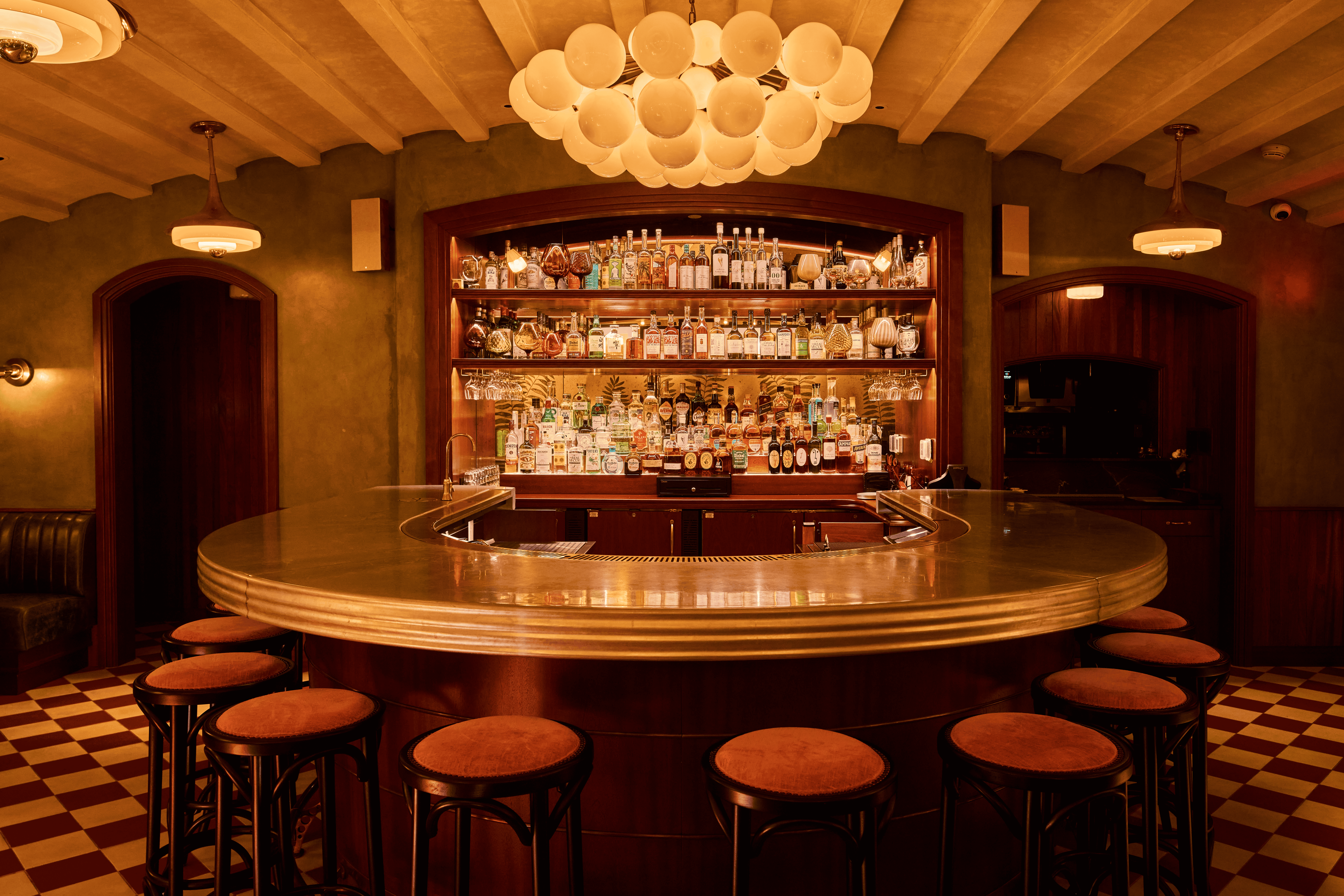 a room filled with furniture and vase on a table