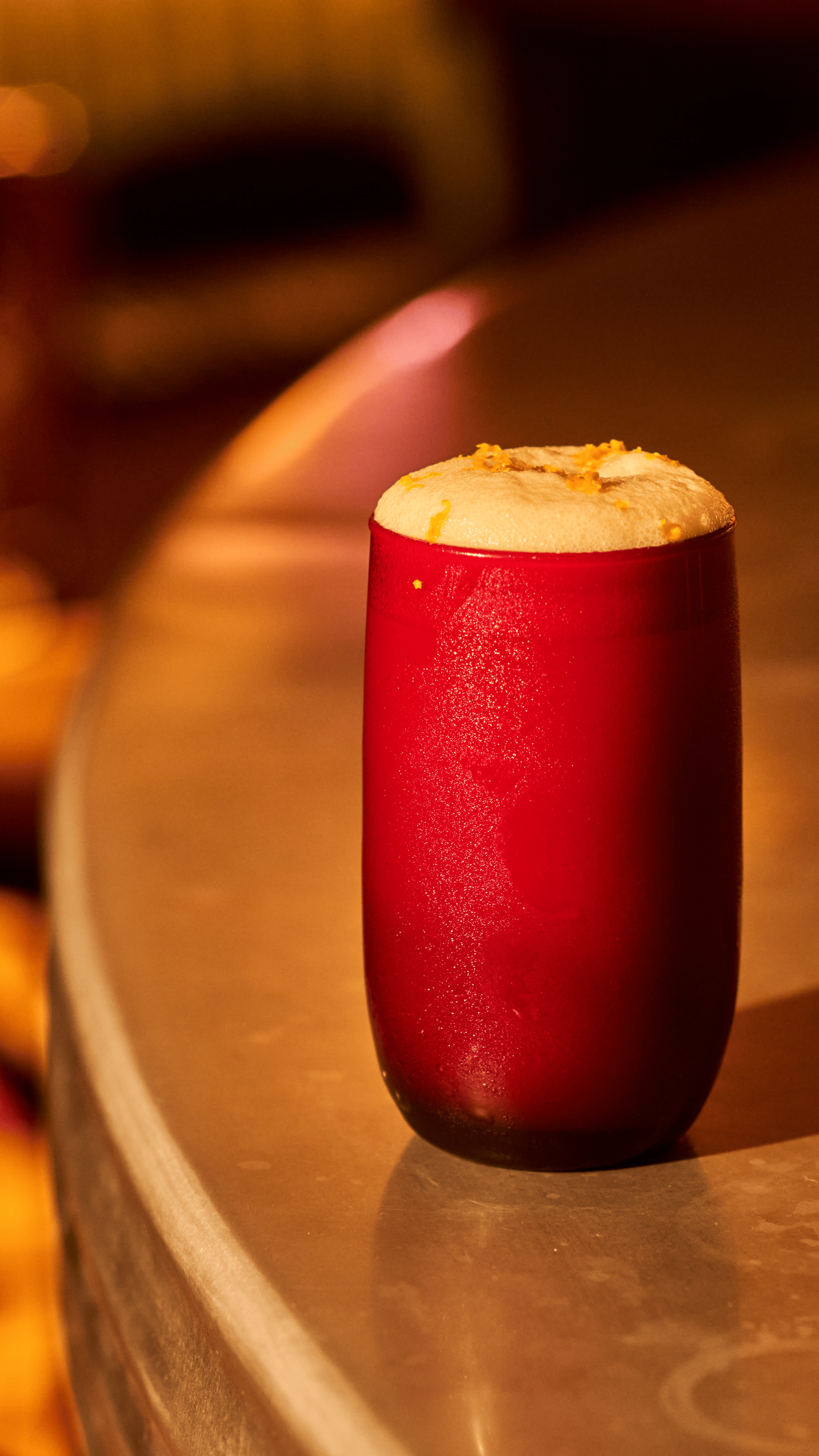 a close up of a glass of orange juice