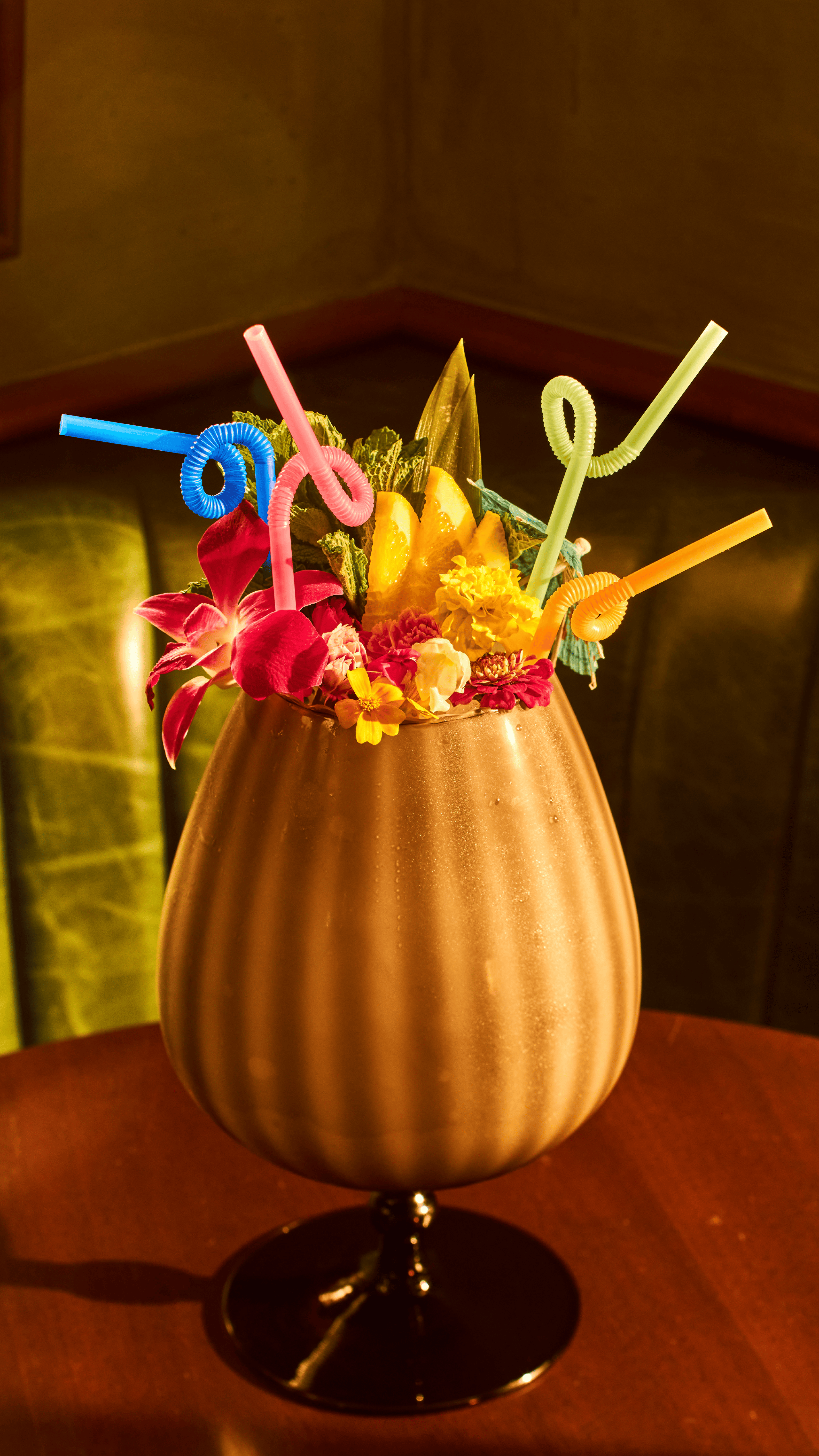 a vase filled with flowers sitting on a table
