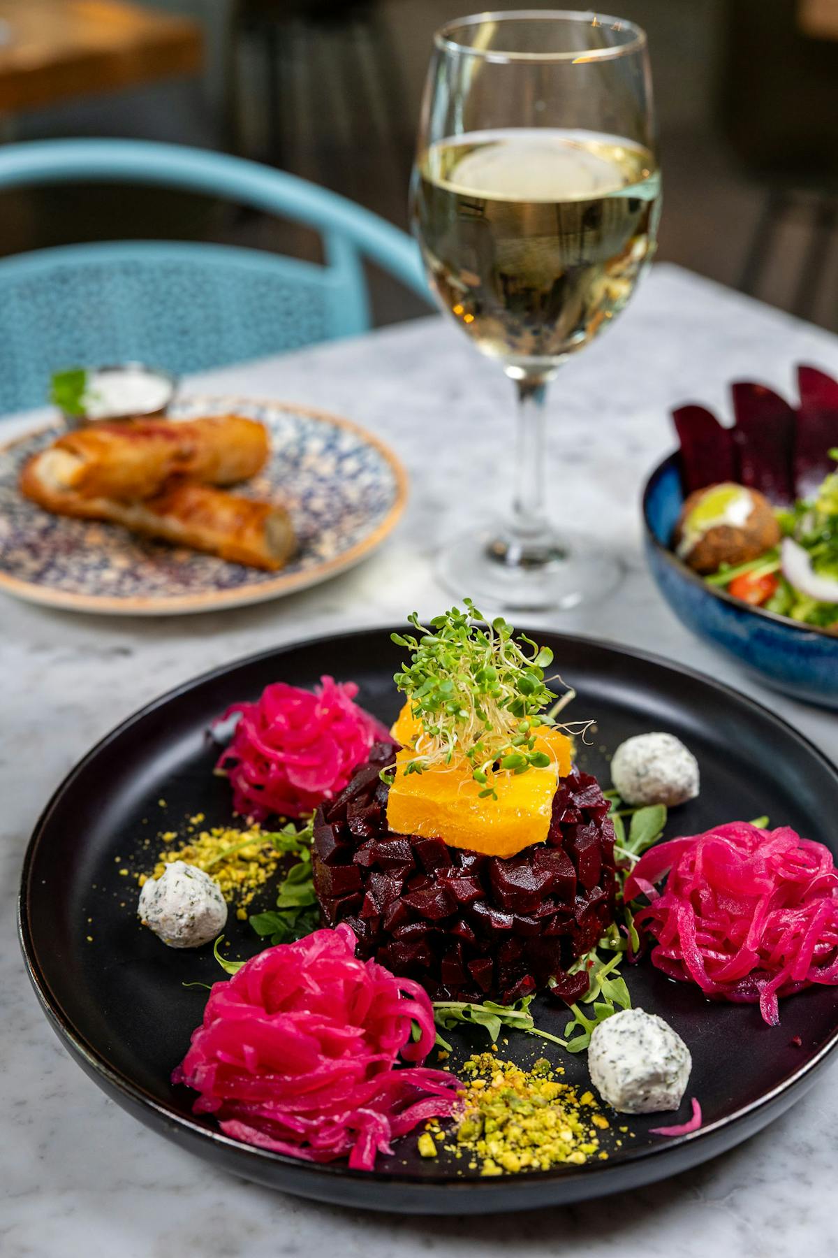 a table topped with plates of food on a plate