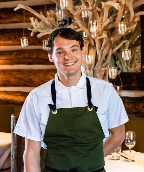 a man smiling for the camera