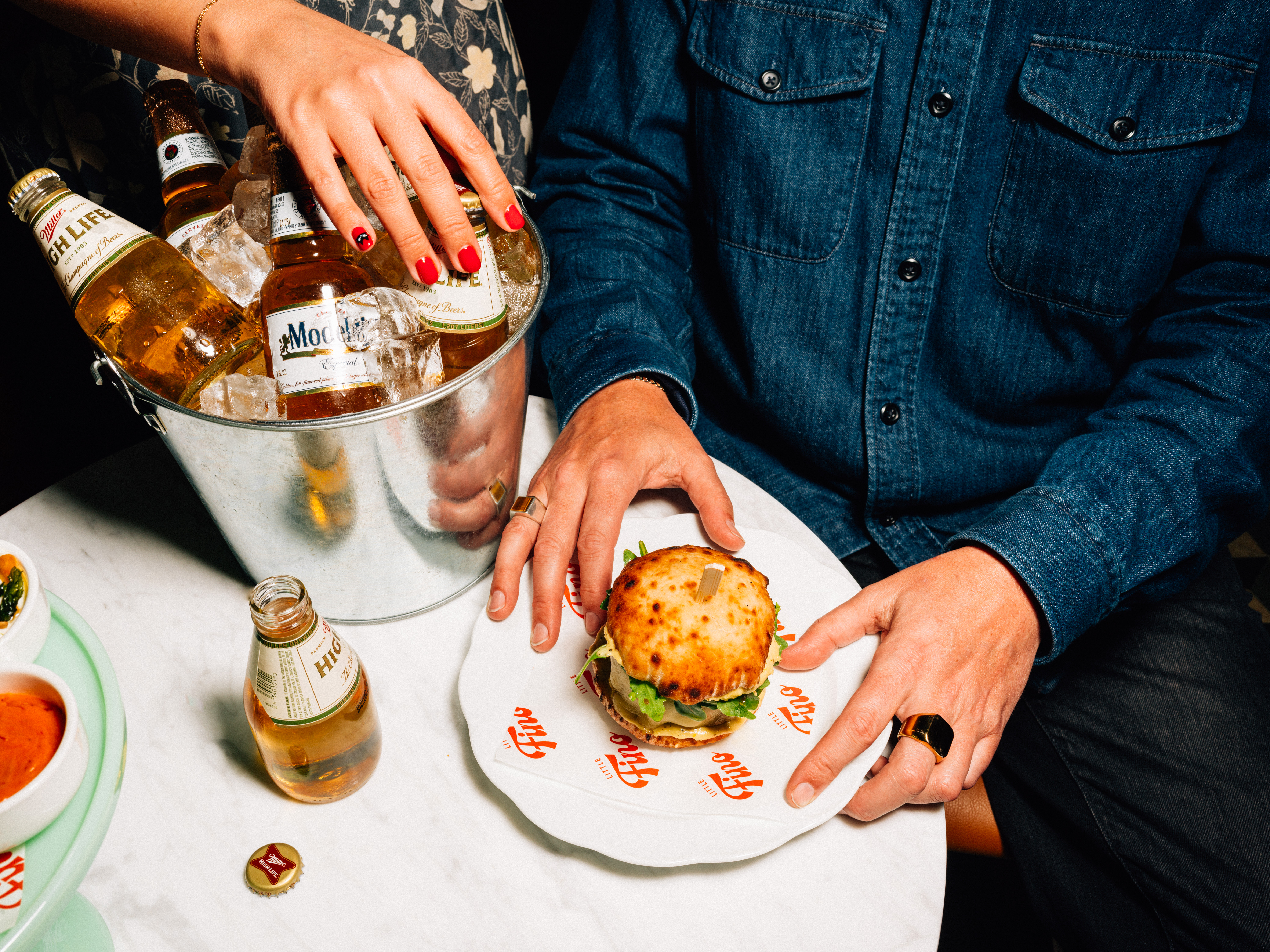 a woman holding a plate of food