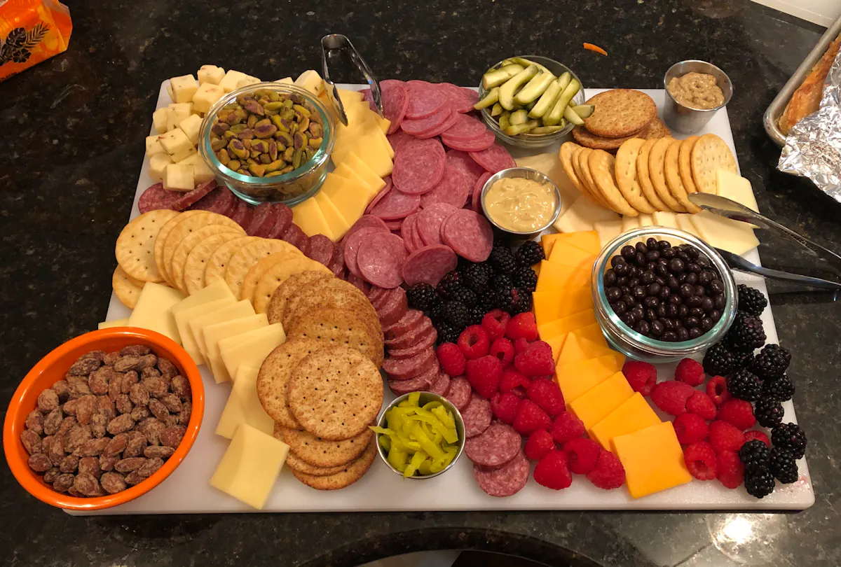 a bunch of different types of food on a table