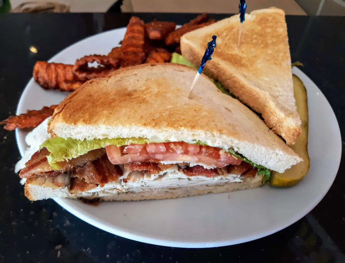 a sandwich cut in half on a plate