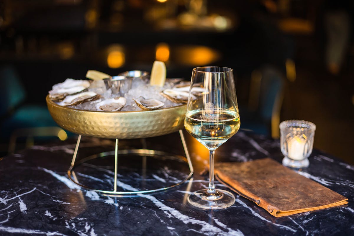 a glass of beer on a table