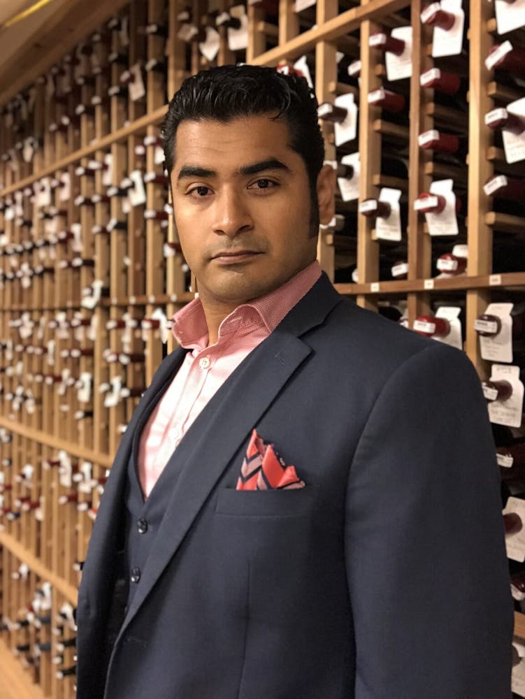 a man wearing a suit and tie