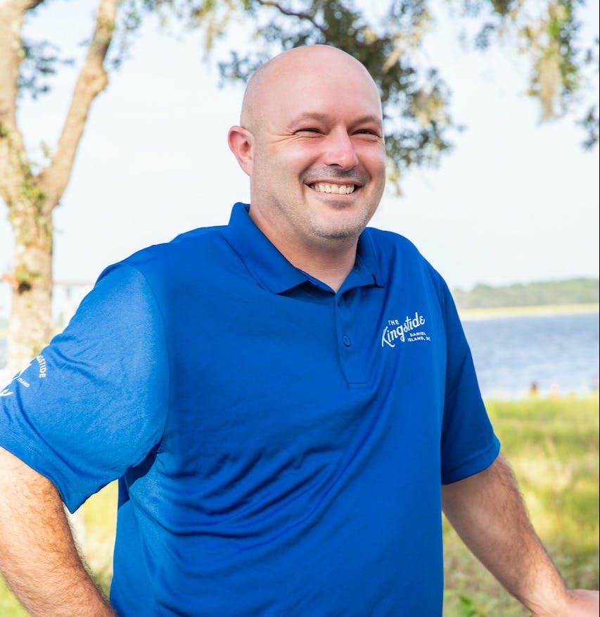 a man in a blue shirt