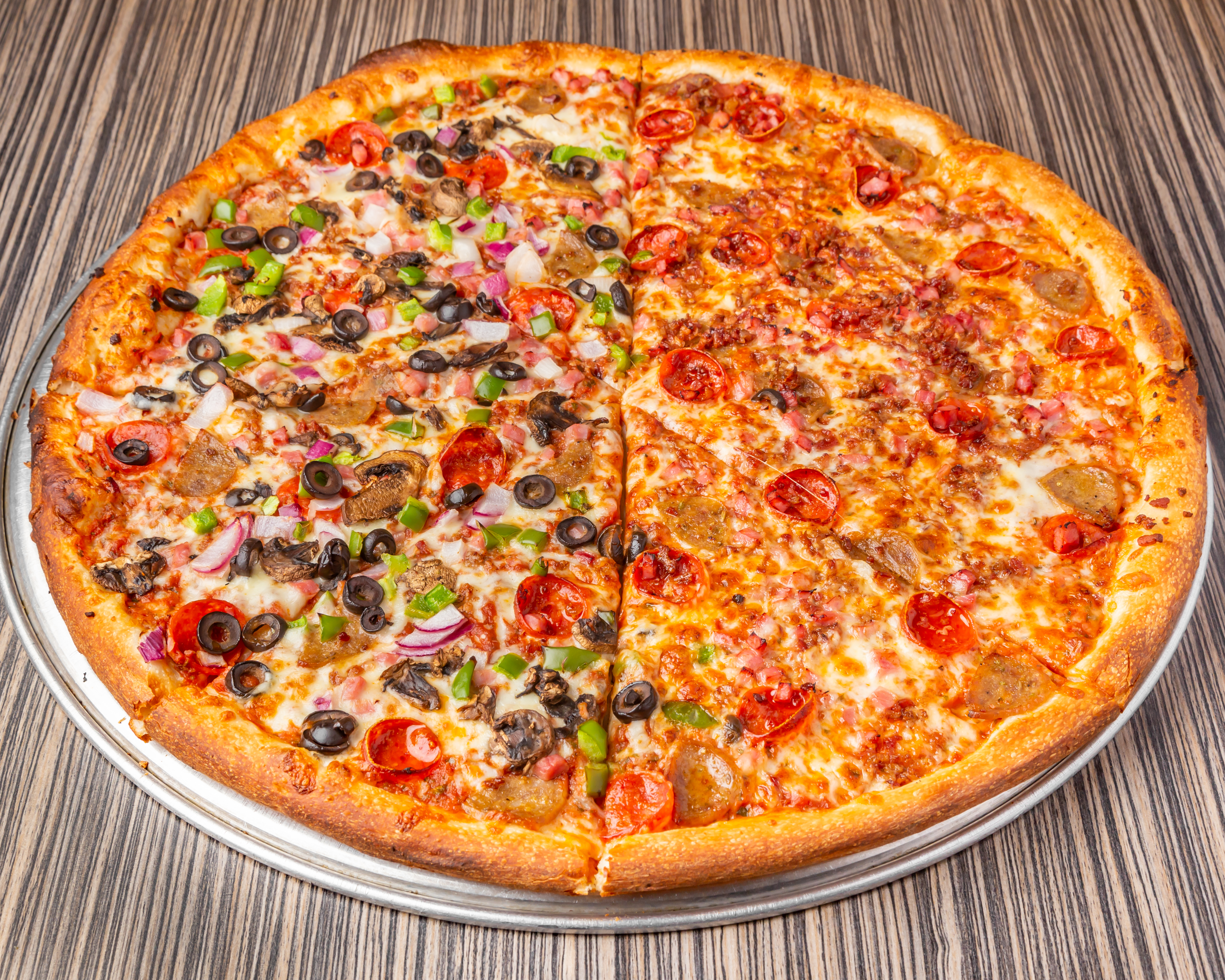 a pizza sitting on top of a wooden table