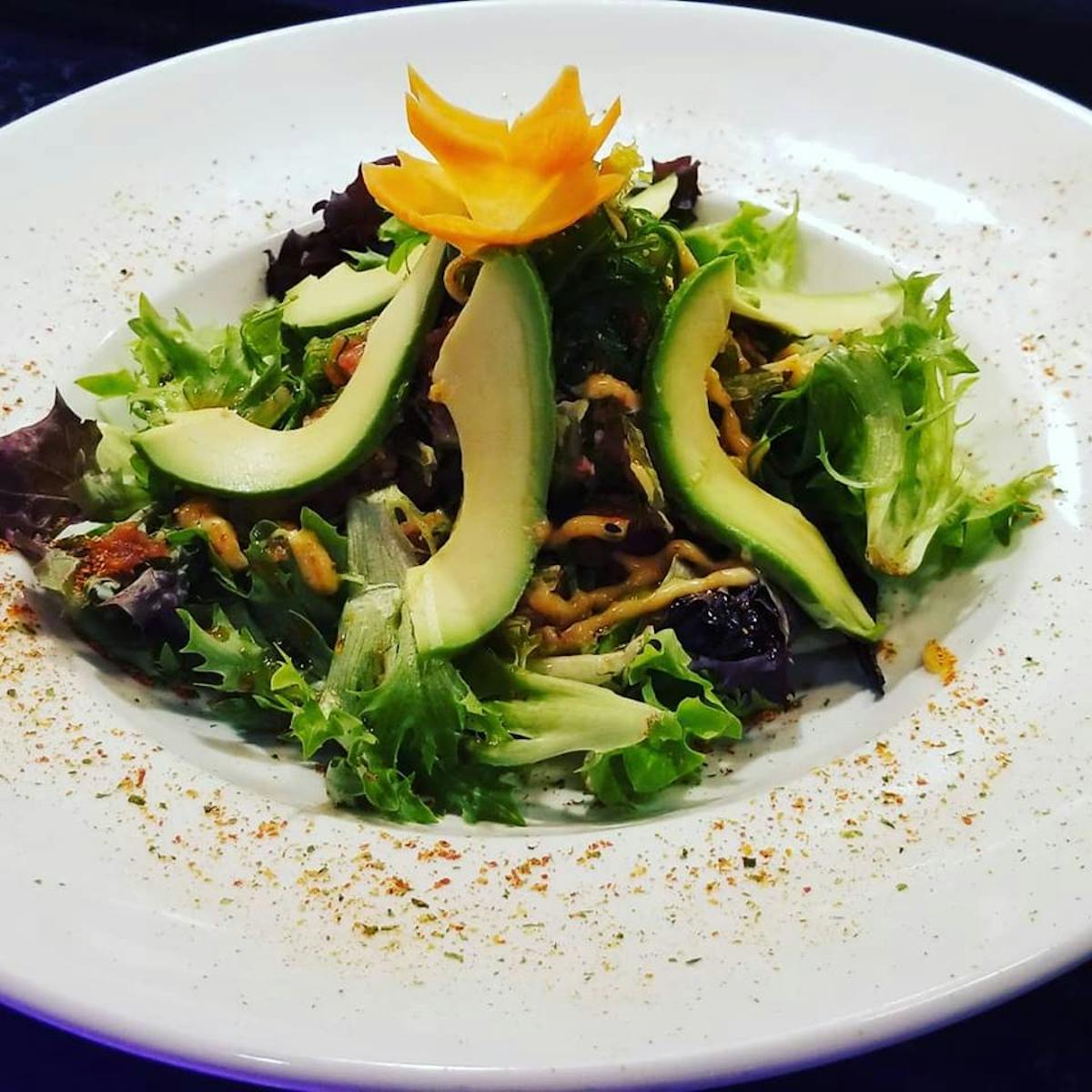 a close up of a plate of salad