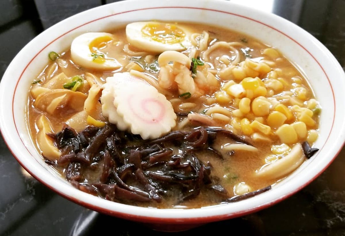 a close up of a plate of ramen