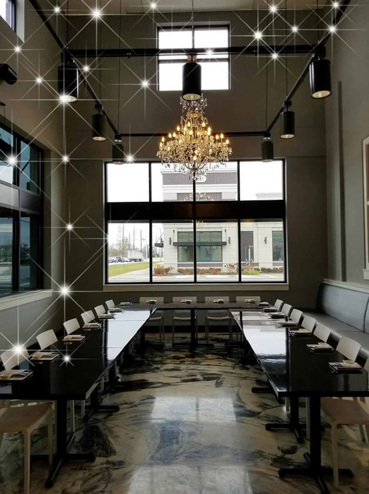 a large room with several dining tables
