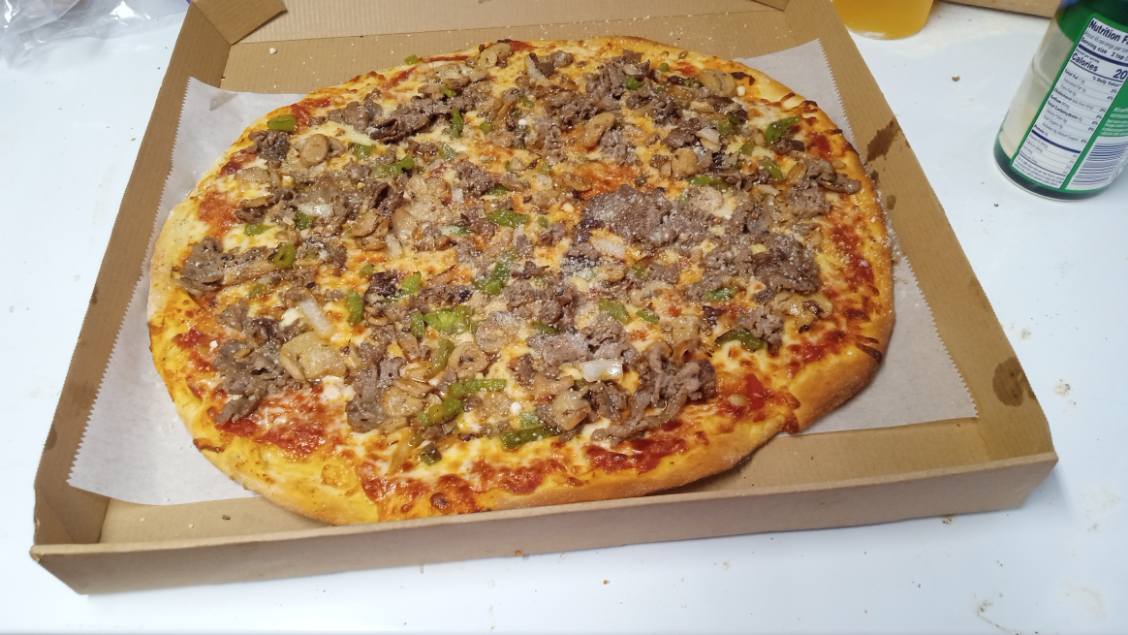 a close up of a pizza