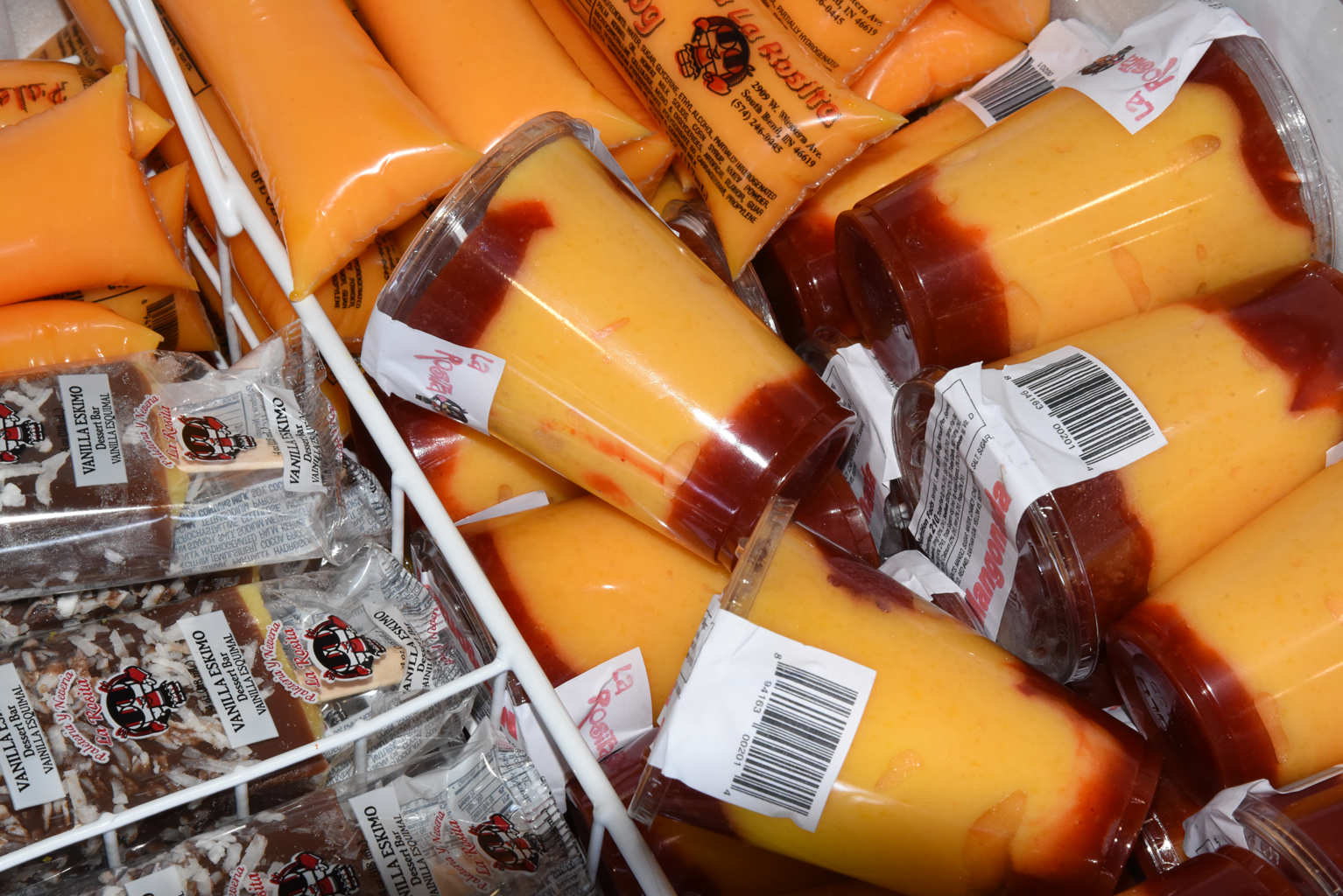 two plastic containers filled with food