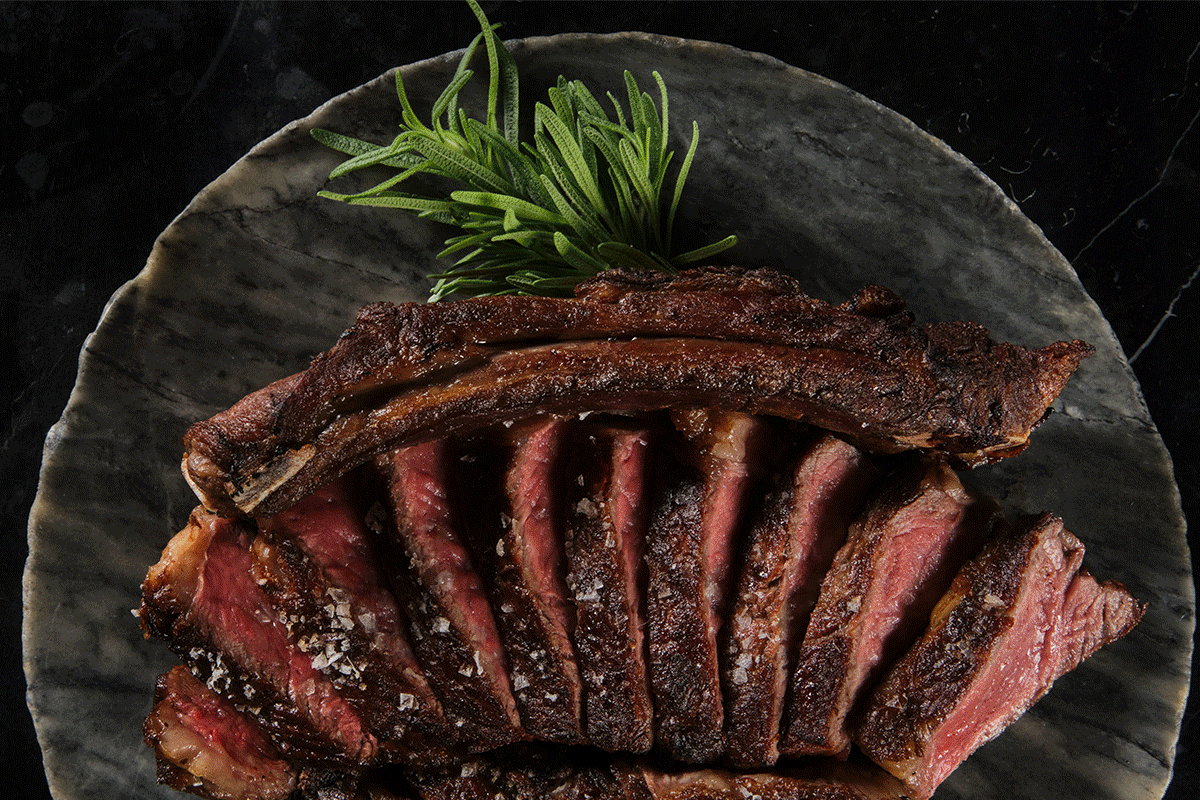 rotating images of steak, fish, and cotton candy lollipop