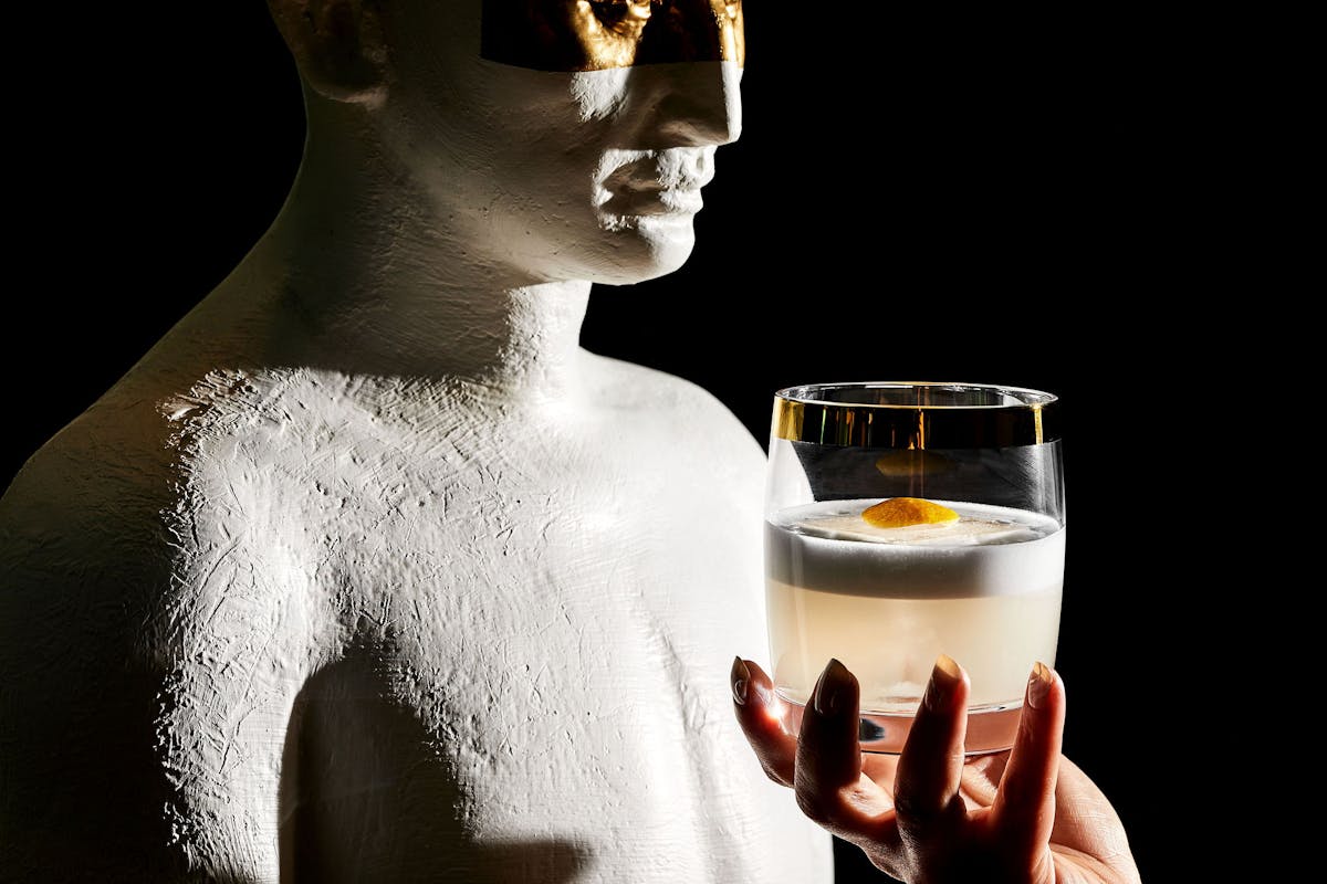 a person holding a cup