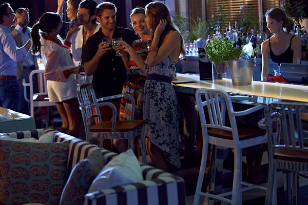 a group of people sitting at a table