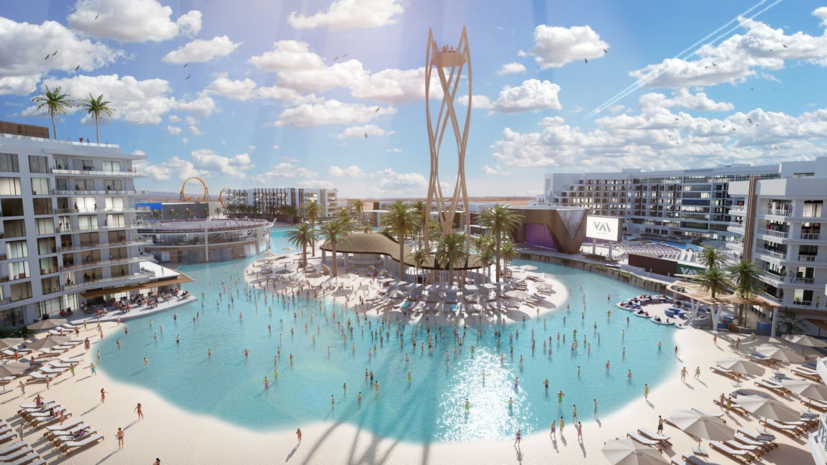 a large body of water with a city in the background