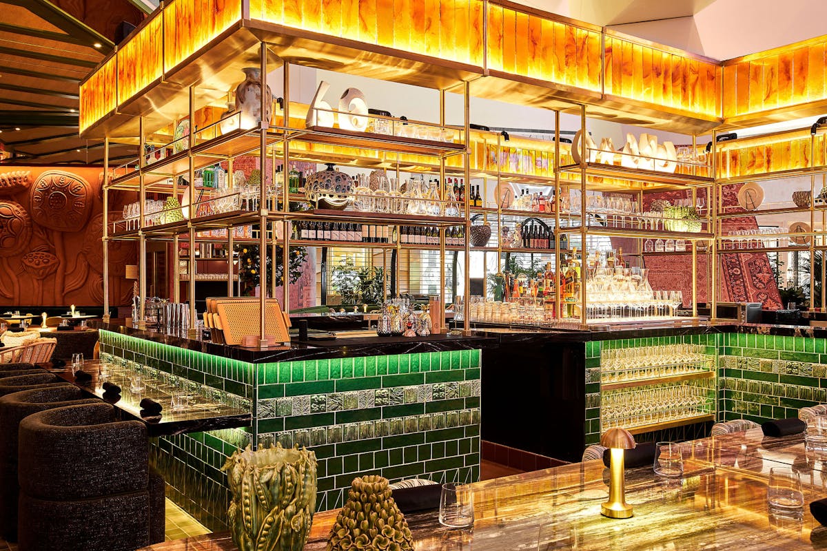 a bar inside the dining room of bazaar mar