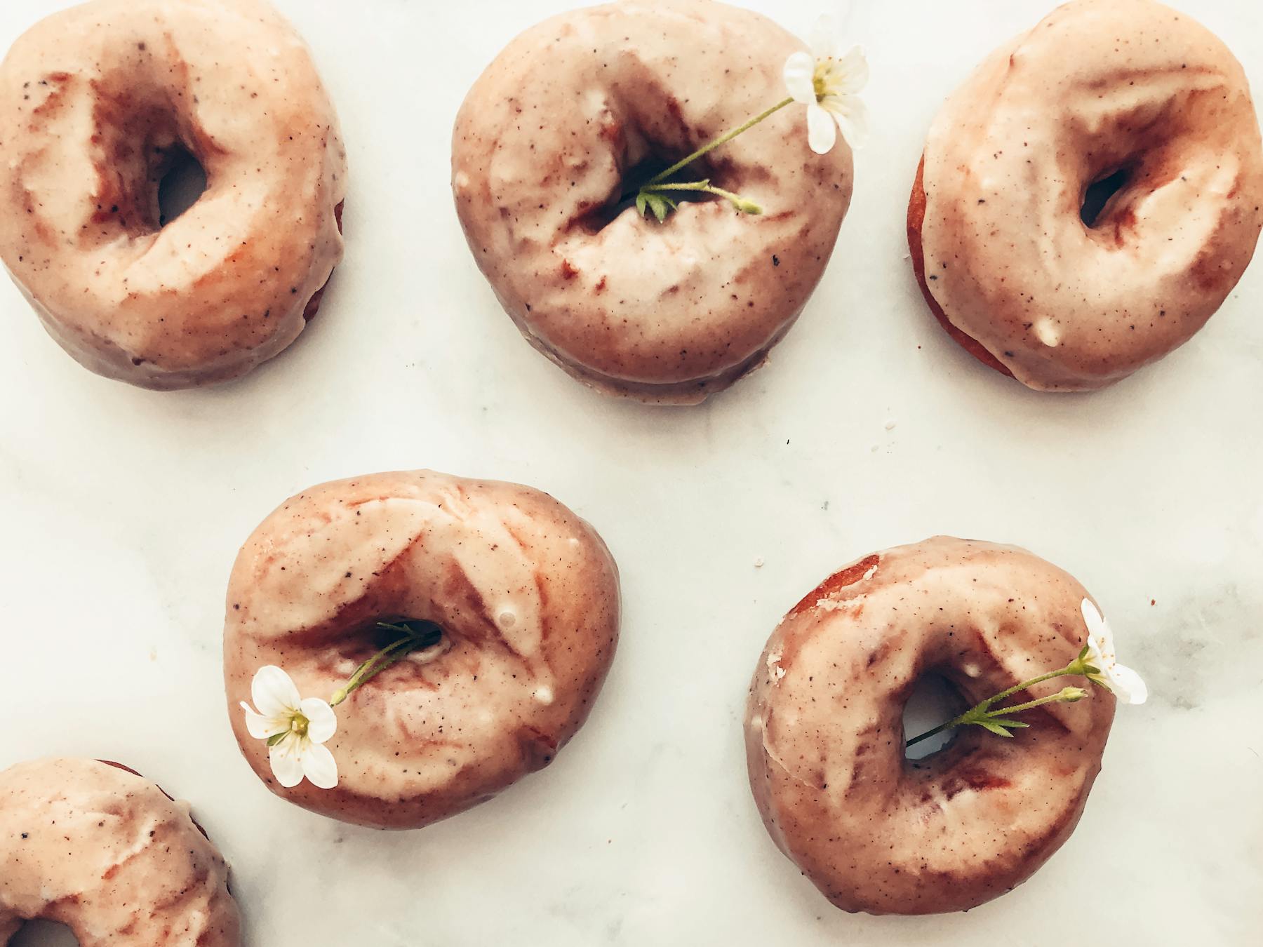 a box filled with different kinds of donuts