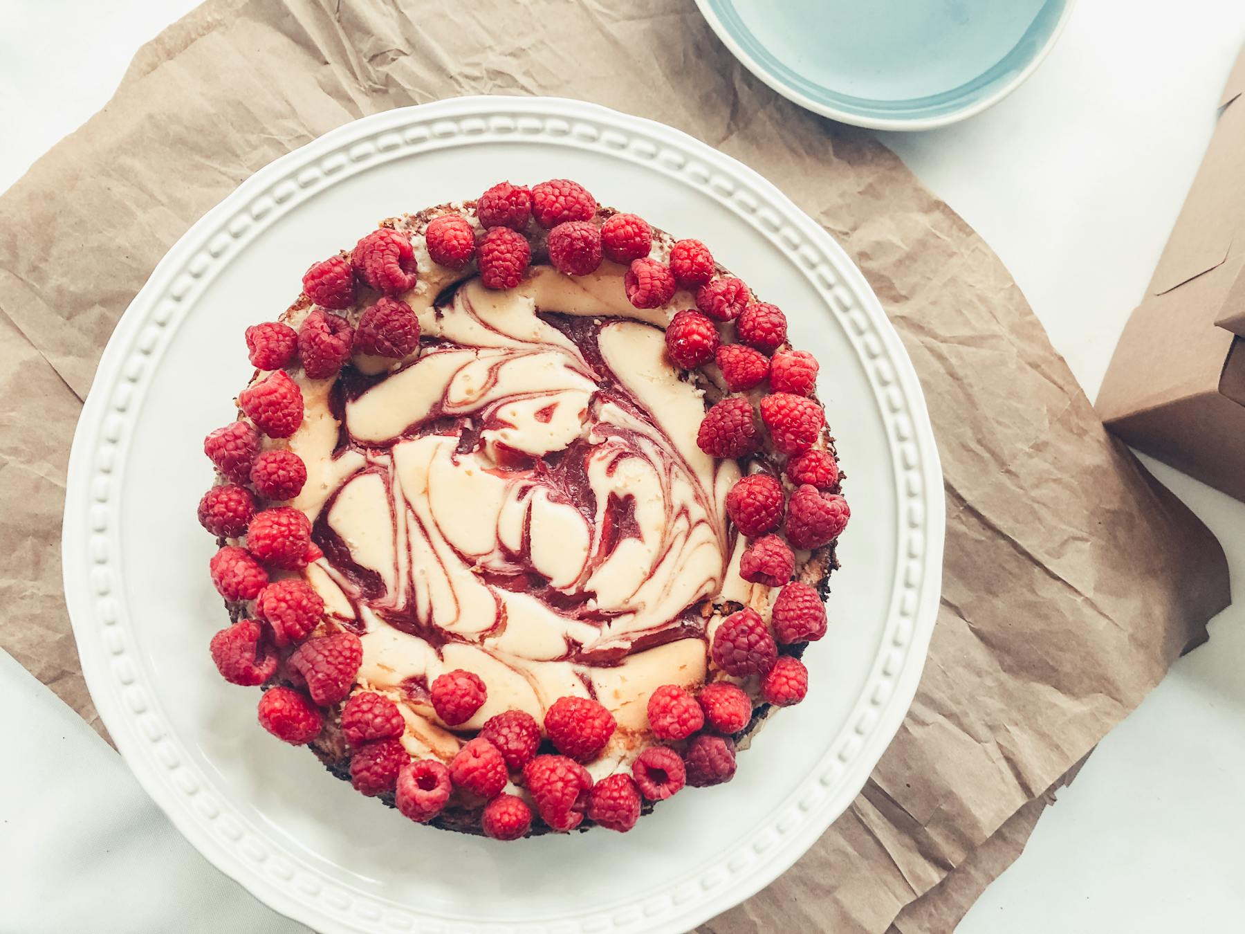 a cake with fruit on a plate
