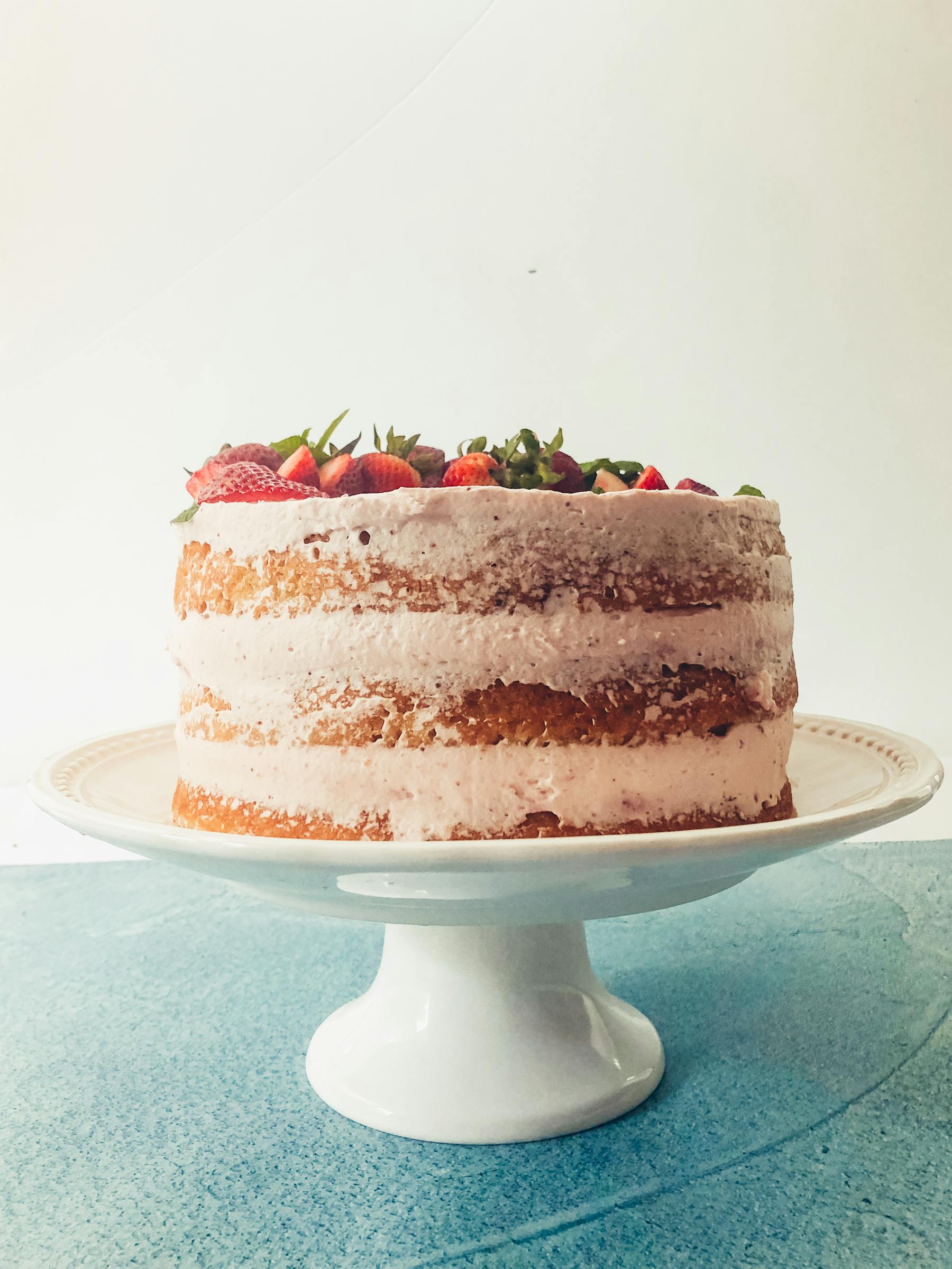 a cake with a dessert on a plate