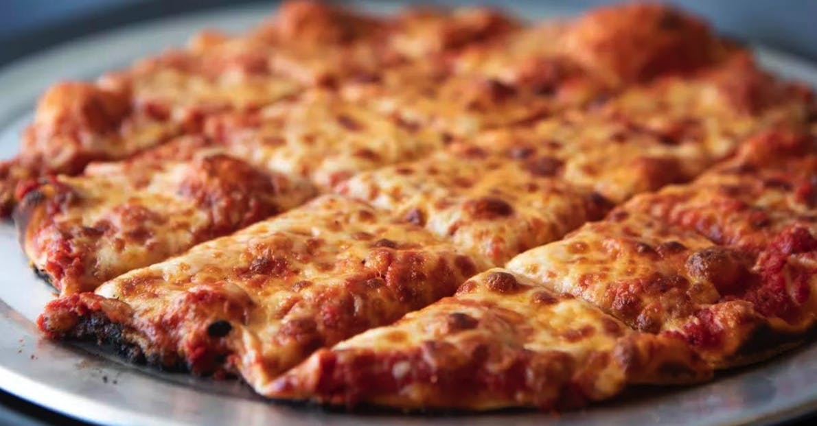 a slice of pizza on a plate