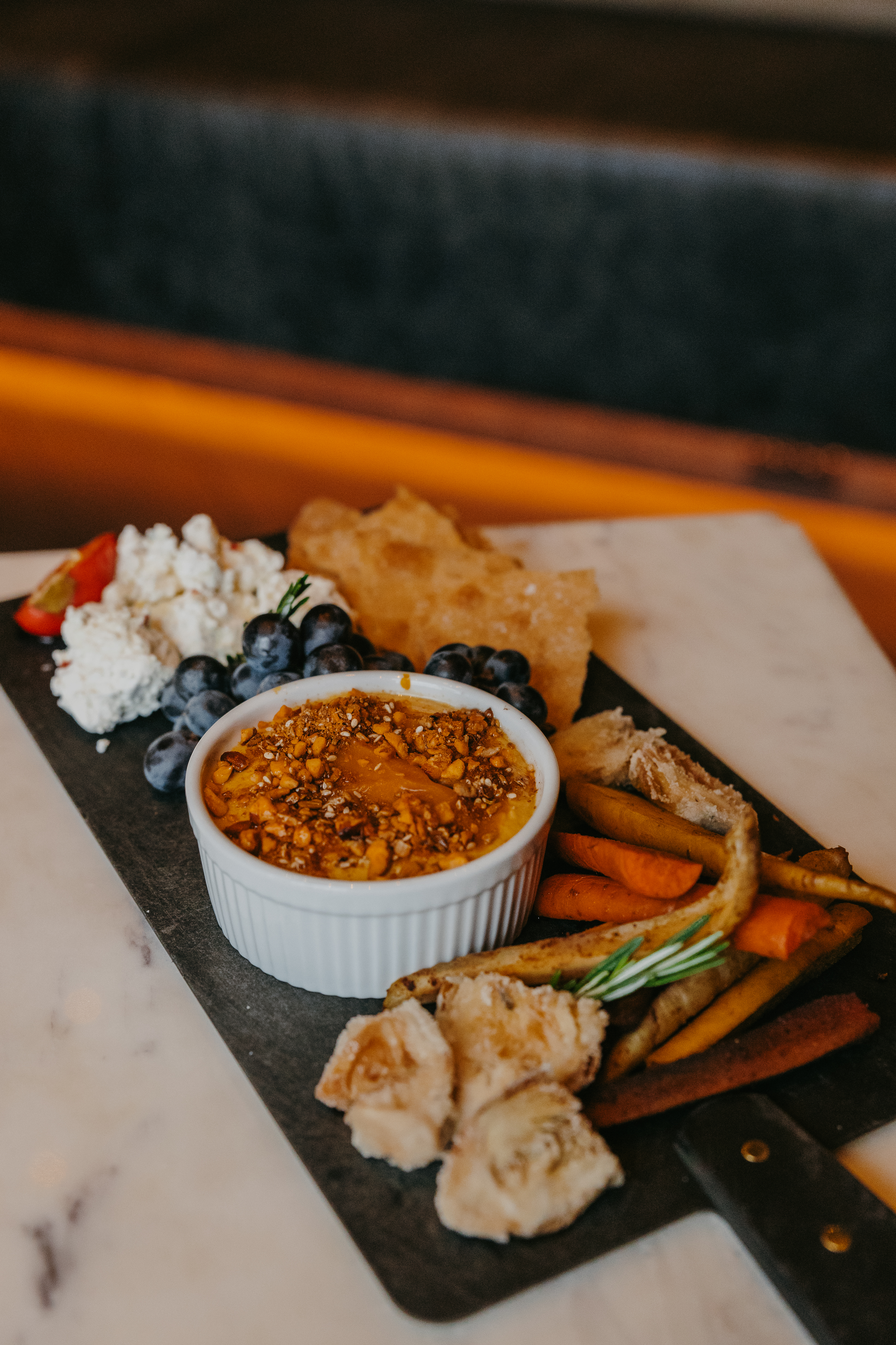 a plate of food on a marble surface