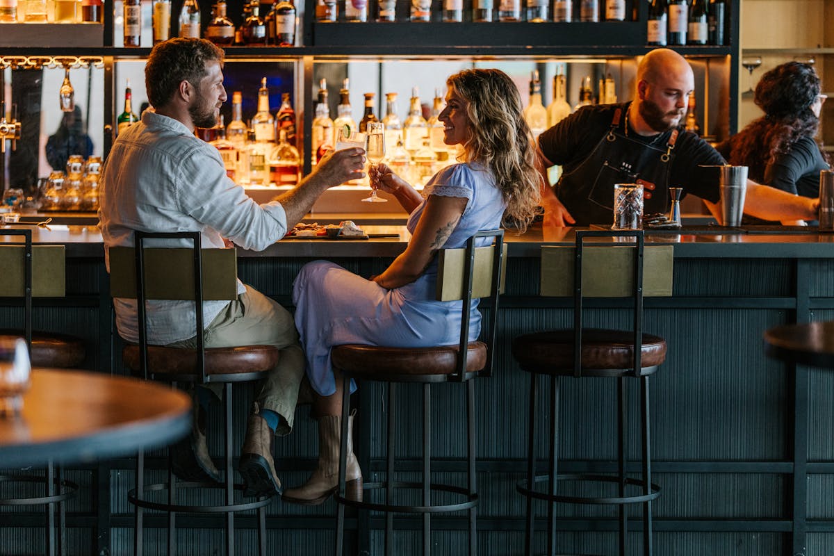 a group of people sitting at a table