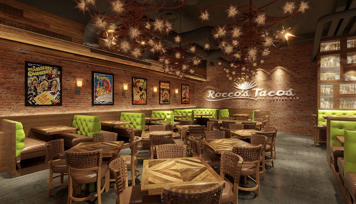 a room filled with furniture and a table in a restaurant