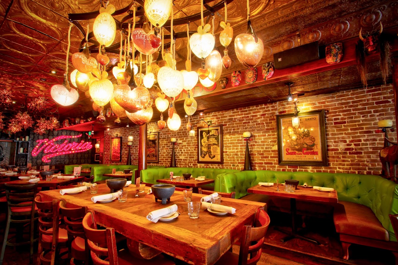 a living room filled with furniture and a fire place