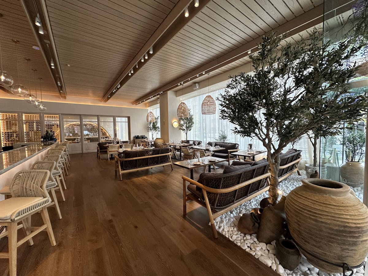 a room filled with furniture on top of a wooden chair