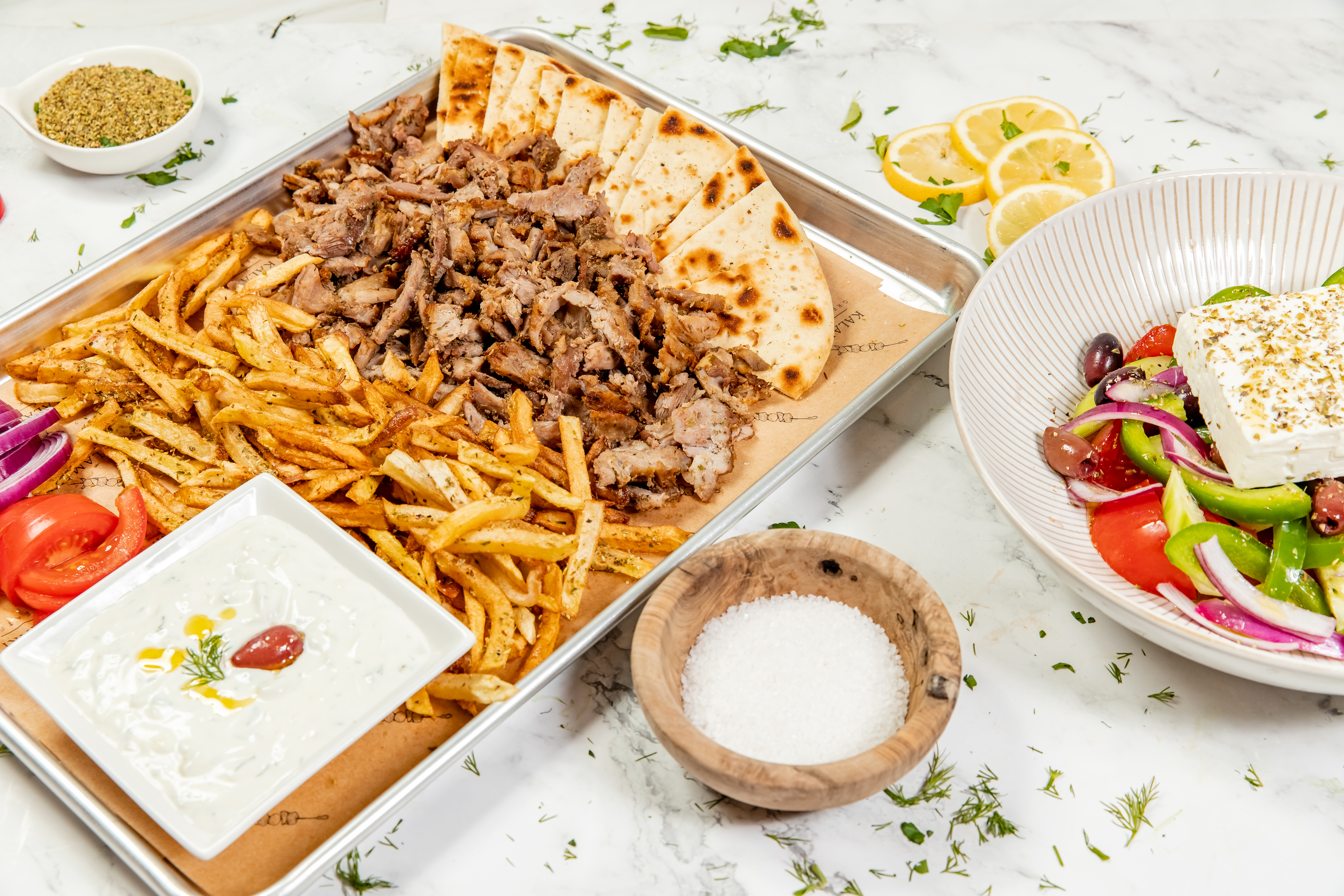 a box filled with different types of food on a plate