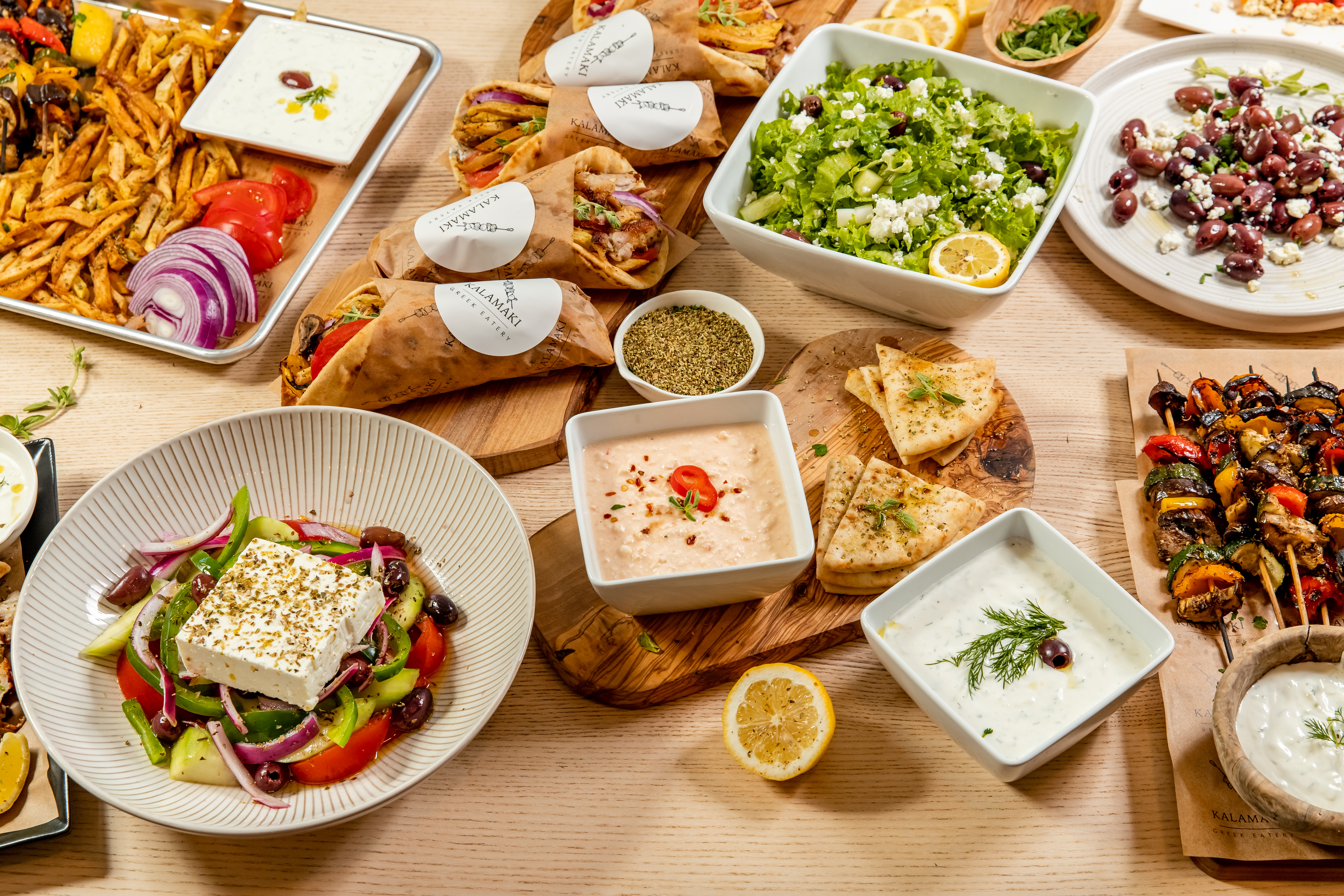 a bunch of different types of food on a table