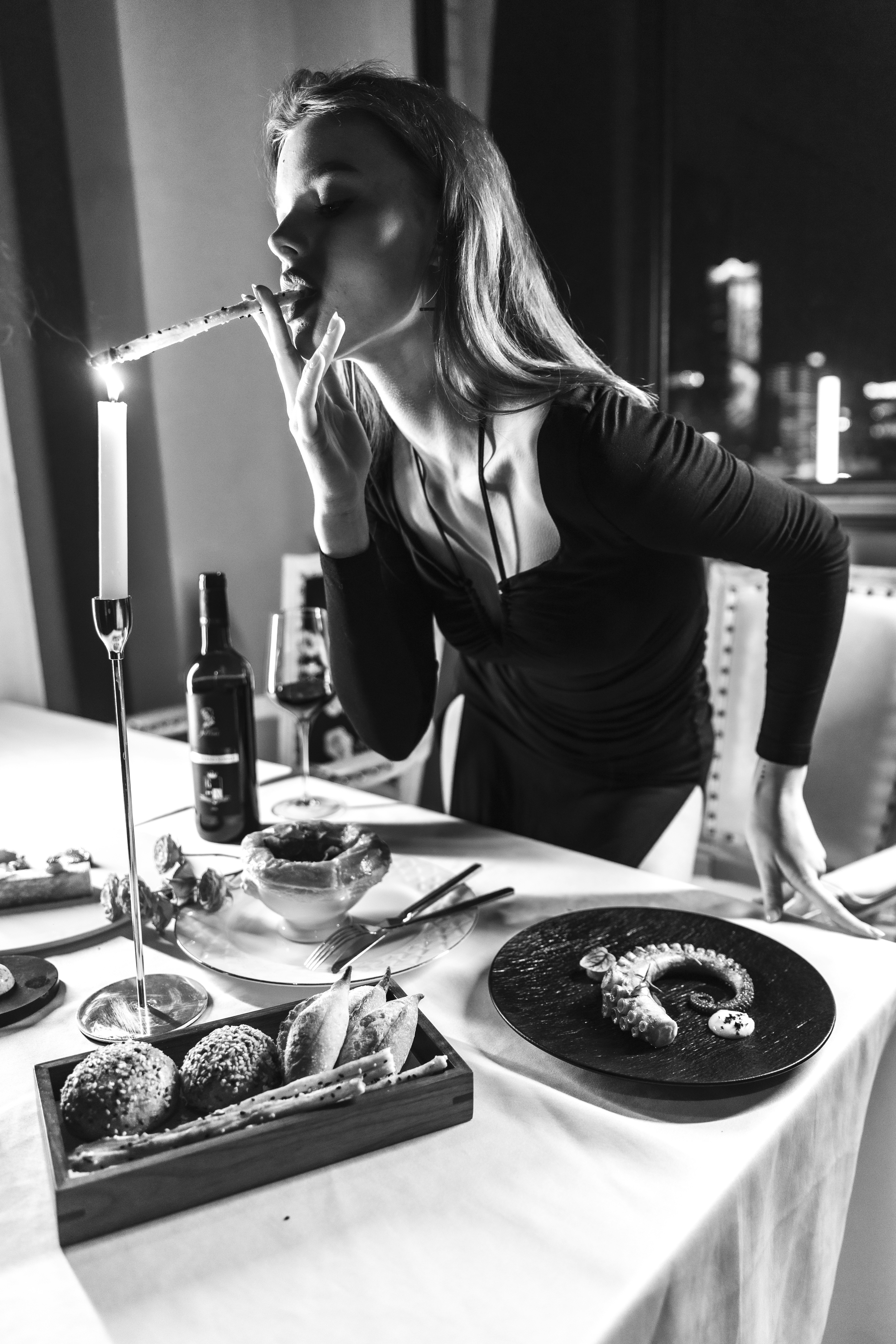 a young boy sitting on a table