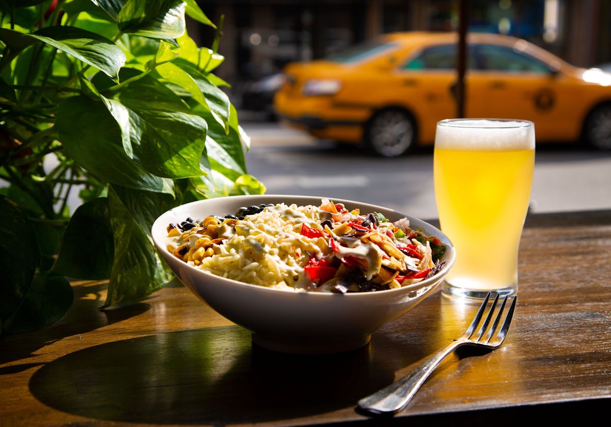 a plate of food and a drink on a table