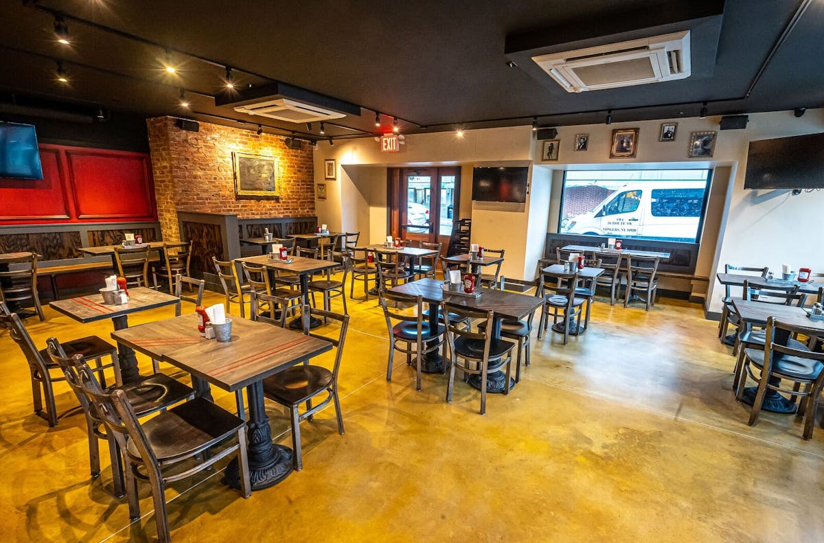 a room filled with furniture and a table