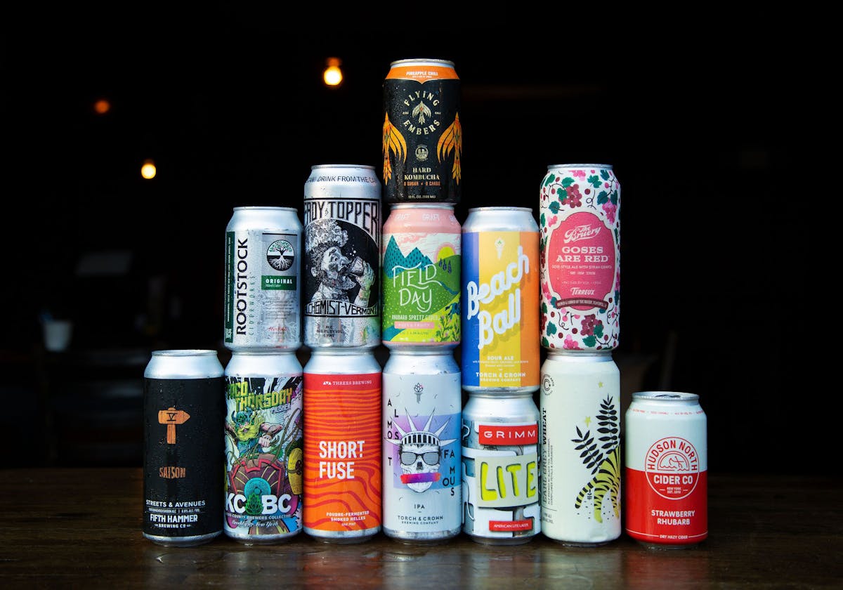 stacked craft beer cans on a table at Rivercrest in Astoria