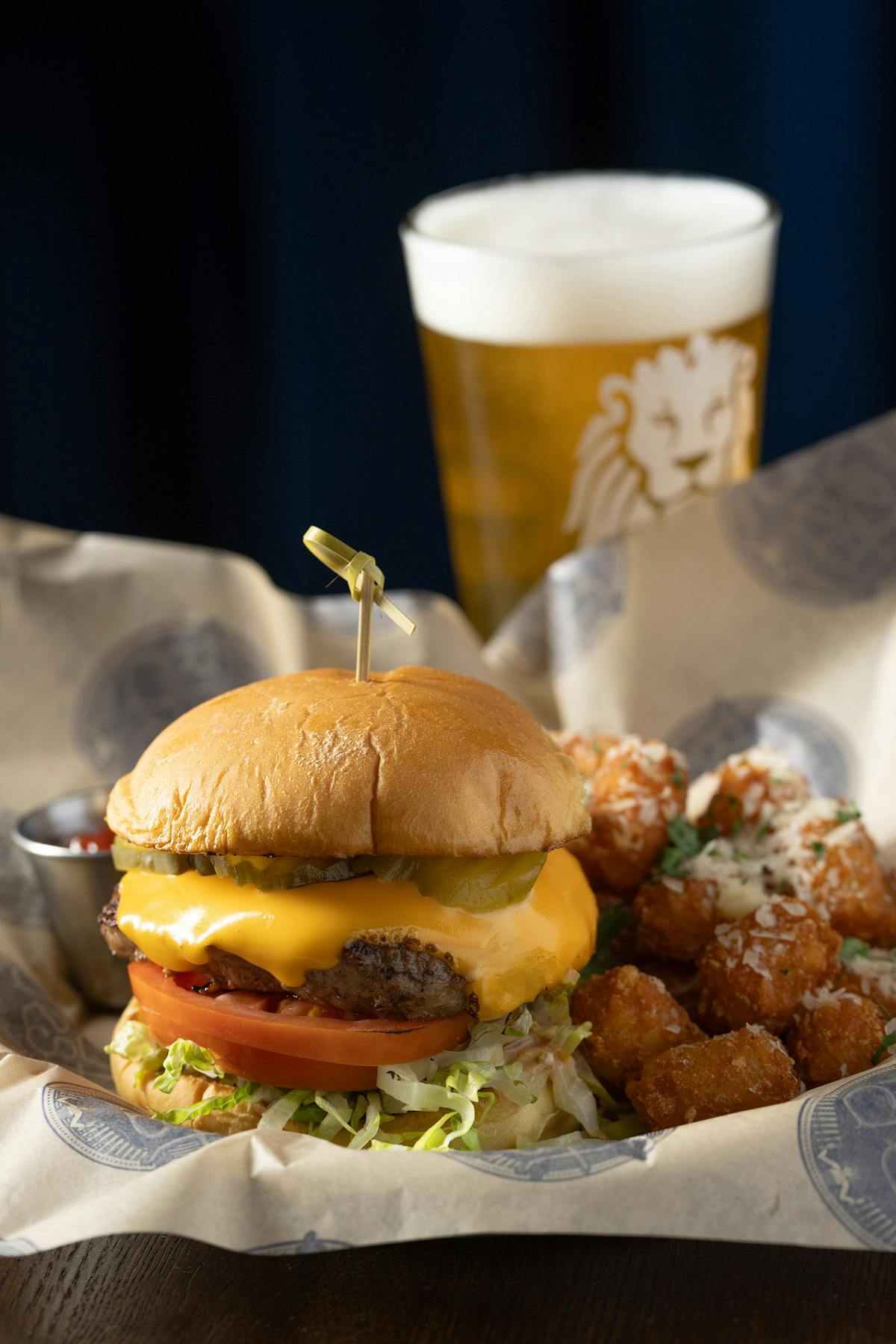 Rivercrest Standard Burger with Tater Tots and draft beer