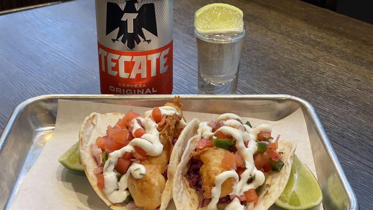 two Baja Fish tacos with a Tecate can and tequila shot for Rivercrest's Triple Threat Thursdays deal