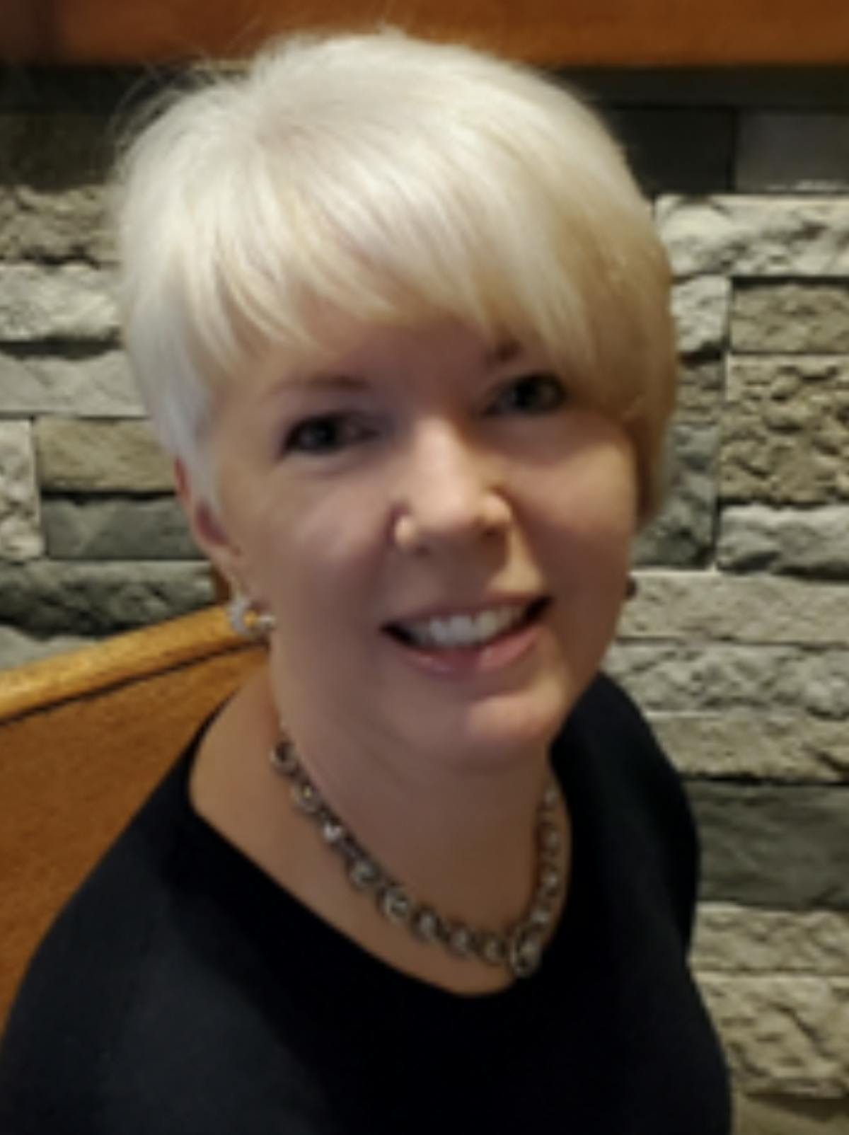 a woman smiling for the camera